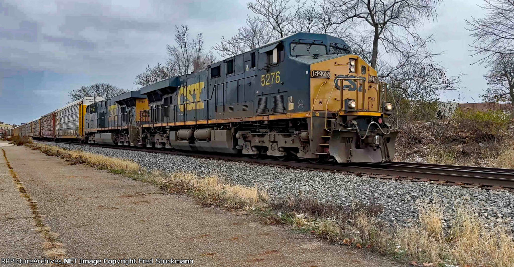 CSX 5276 leads M225.